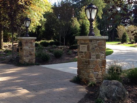Design ideas for a front yard <b>stone</b> <b>driveway</b> in New York. . Stone pillars for driveway entrance